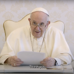 Pope Francis reading message