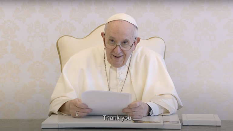 Pope Francis reading message