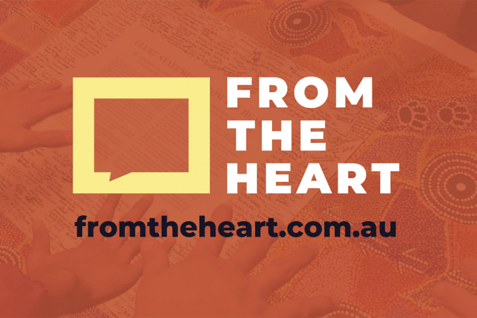 Yellow speech bubble is in the centre of the image with "FROM THE HEART" in white writing next to it. Underneath is black text reading "www.fromtheheart.com.au". All on a background of red sand.