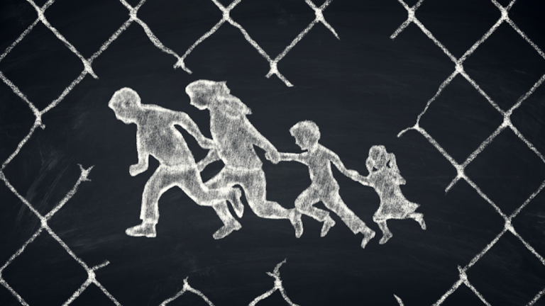 An image drawn on a chalkboard: The Silhouette of a family with two young children fleeing, bordered by chain link fencing