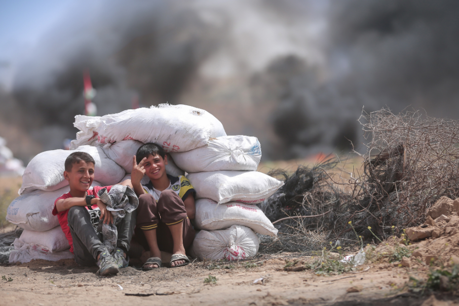 Two Young Children In Gaza, Smiling and Playing